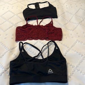 3 pack (2 sports bras and one racer back lace bra). Make an offer if interested!